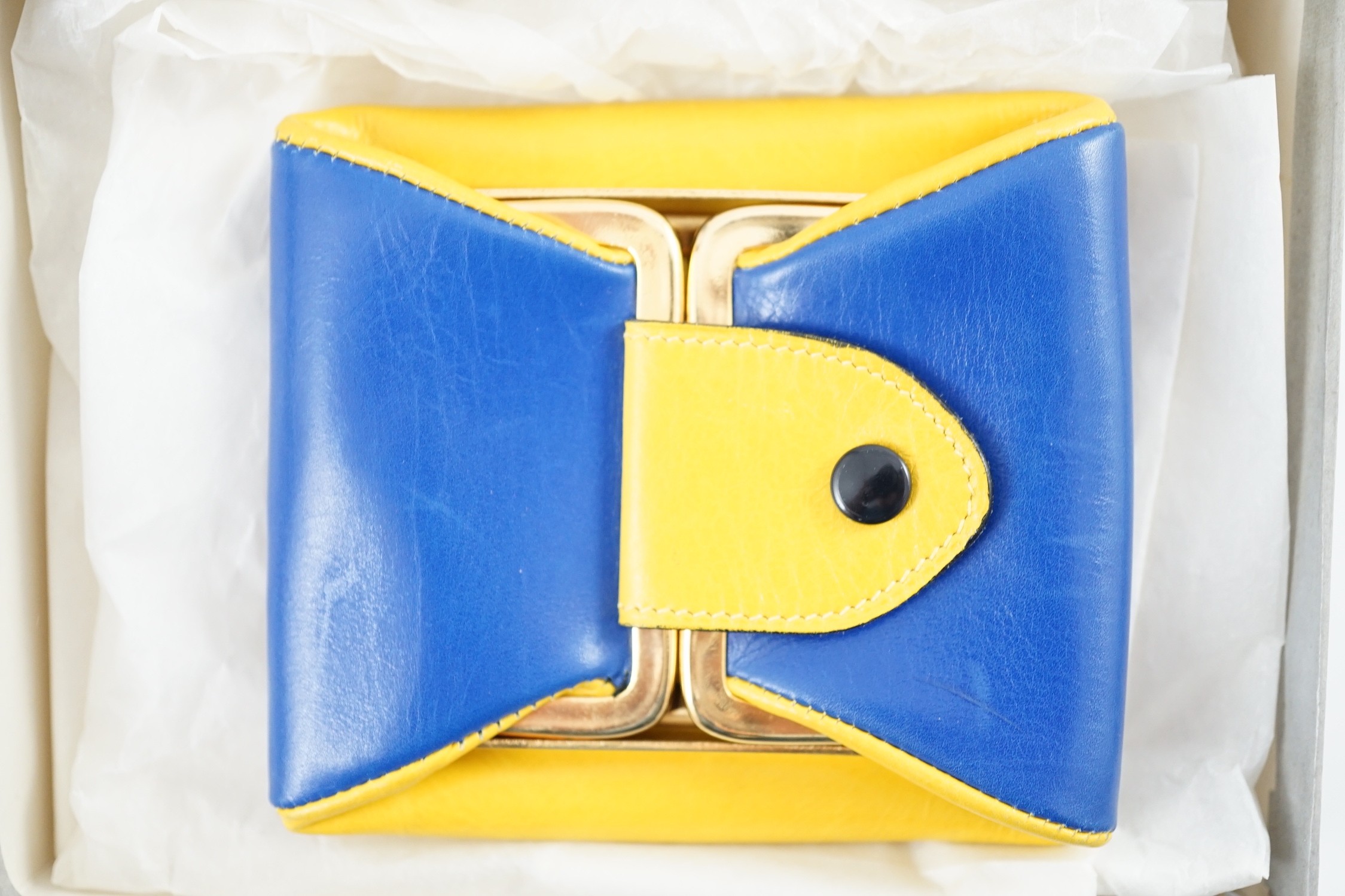 A boxed Gucci yellow and blue leather purse, 9 cm.